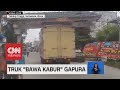 Viral! Truk 'Bawa Kabur' Gapura