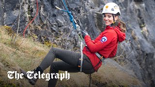 Prince William and Kate abseil together off Brecon Beacons cliff