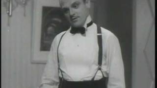 James Cagney shows Mae Clarke the door