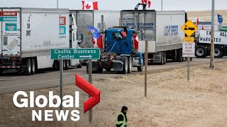 Trucker convoy: RCMP begin taking action on truck blockade near Alberta-Montana border