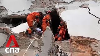 China quake death toll rises as rescuers search for hundreds still missing