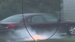 Watch: Downed power line causes car explosion