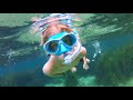 kids snorkeling in freshwater spring 4k