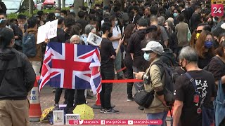 Crowds gather outside Hong Kong court after dissidents charged