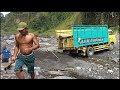 miners and trucks working in sand mining loading 6 cubic sand - andhry ex