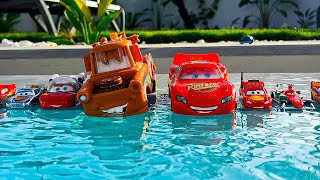 Disney Pixar Cars falling into deep pool, Lightning McQueen, Tow Mater, Mack, Sa