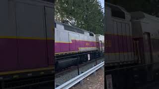 MBTA Commuter Rail engine #1056 rolls past Summer Street with horn salute 4/14/2023