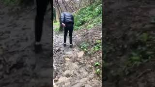 Lad loses balance on muddy walk (MUST WATCH)