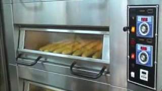 FOULHOUX BAKERY EQUIPMENT INC CANADA DECK OVEN BAKING FRENCH BREAD.wmv