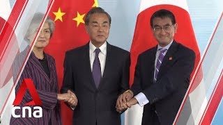 China, South Korea and Japan pledge to resolve tensions