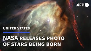 NASA celebrates Webb telescope anniversary with close-up of stellar birth | AFP