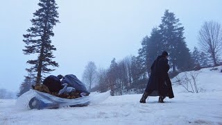 Hot Tent Snow Camp in the Forest. Wood stove. Winter camping in tent with stove, buttery roasting