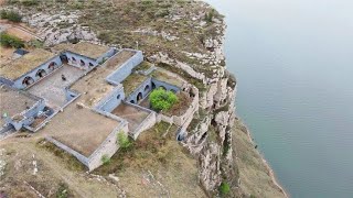 建在黄河悬崖上的古寺，竟历经500年不倒，为何70岁老和尚被扔进黄河？