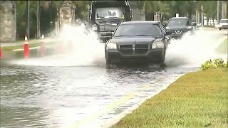 Water management officials prepare for flooding during king tide, Dorian