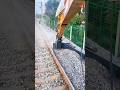 Use of machines for leveling railway line stones