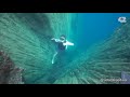 guy falls off an underwater cliff