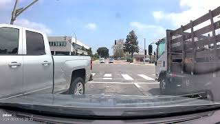 Driver Resumes Boogie Sing-Along Moments After Truck Almost Hits Him