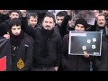 Angry Kurds bury victims of Turkish attack