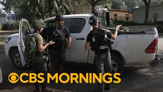 Armed civilian guards protect evacuated kibbutz near Gaza border