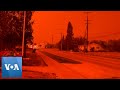 Wildfires Turn Skies Red in Canada | VOA News