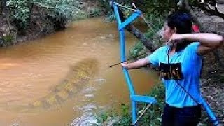 Amazing Girl Uses PVC Pipe Compound BowFishing To Shoot Fis - Caught 20Kg Python Near Village