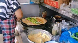 Street food - Corn flatbread - Chinese tortilla with lettuce, sausage, tenderloin