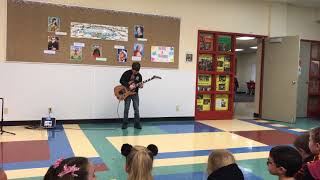 9 year-old kid plays Eruption by Van Halen at 3rd grade talent show