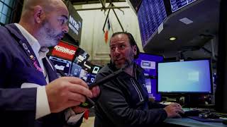 Wall Street ends near flat ahead of inflation data