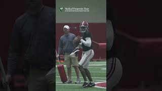 Jalen Milroe throws passes with the Alabama quarterbacks at the Crimson Tide's 13th spring practice