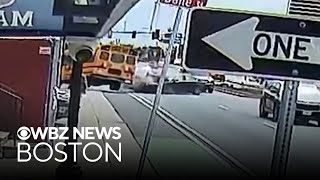 Video shows car crash into school bus in Everett
