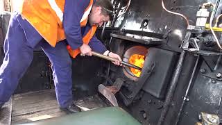 The inside on Footplate is, BR Standard Class 7MT 4-6-2 No.70000 'BRITANNIA', Coal into the Firebox.