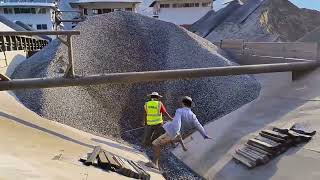 Amazing work - Ship has docked crushed stone loaded by conveyor