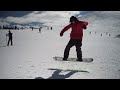 your first backside 180s on a snowboard