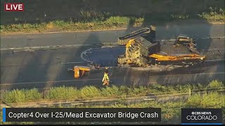 Excavator being hauled by semi crashes into bridge on I-25 in northern Colorado