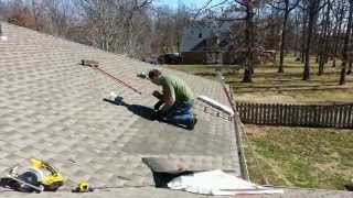 Knocking down a chimney and patching the roof