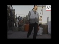 red cross distributes aid in rafah refugee camp after incursion