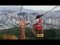 busan geumgang park cable car with a dense forest and superb view