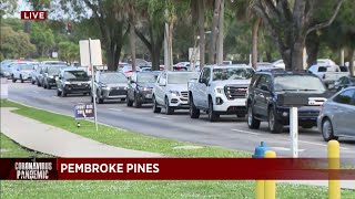 Drivers wait for hours to get tested for COVID-19 in Pembroke Pines