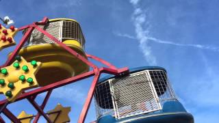 Brielle loving riding tiny Ferris wheel