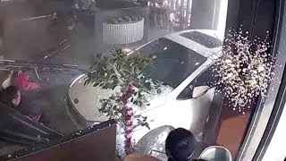 Two injured when unlicensed drunk driver ploughs car into busy restaurant