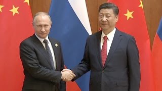 China, Russia Play Role of "Ballast Stone" in World Peace, Stability: Xi Jinping