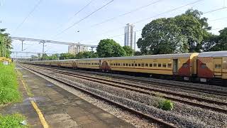 An unknown WAG 9 with the 06453 Ernakulam Kottayam Express Special at Tripunithura station..