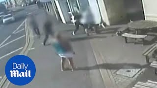 Moment man is violently hit in face with hammer outside pub