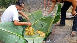 Peru. Chickens Roasted Underground with Hot Stones. Preparing \