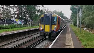 Trains at Longcross Least Used station in Surrey