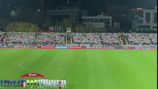 Every Kosovo fan holds up an England flag during the national anthem- ENGLAND  VS KOSOVO 2019