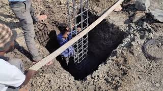 Placing of column bars and checking with plumb bob