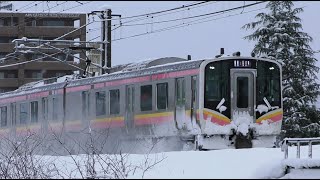 雪の中を進むE129系B26編成 信越本線上り428M