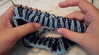 brPLsl dec (left leaning brioche purl decrease)