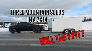 Three snowmobiles in a 7x14 enclosed trailer